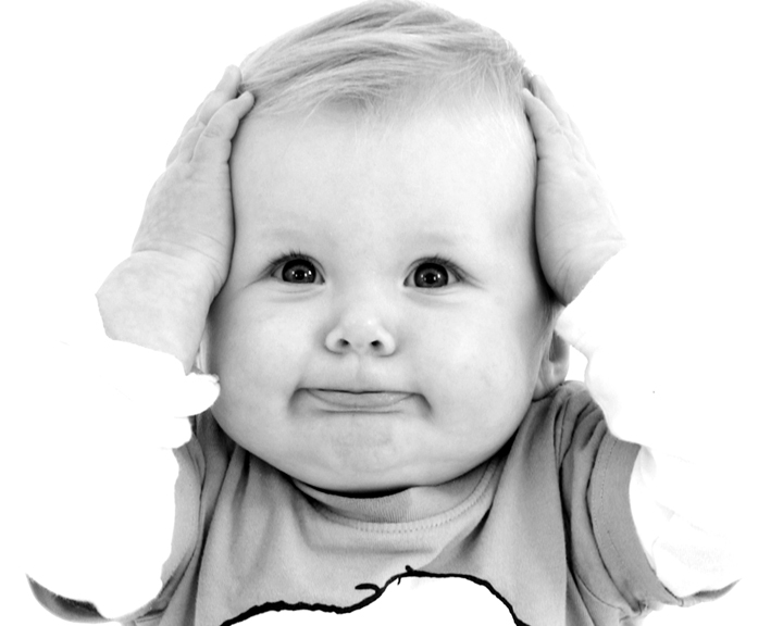 Baby with hands on their head in black and white
